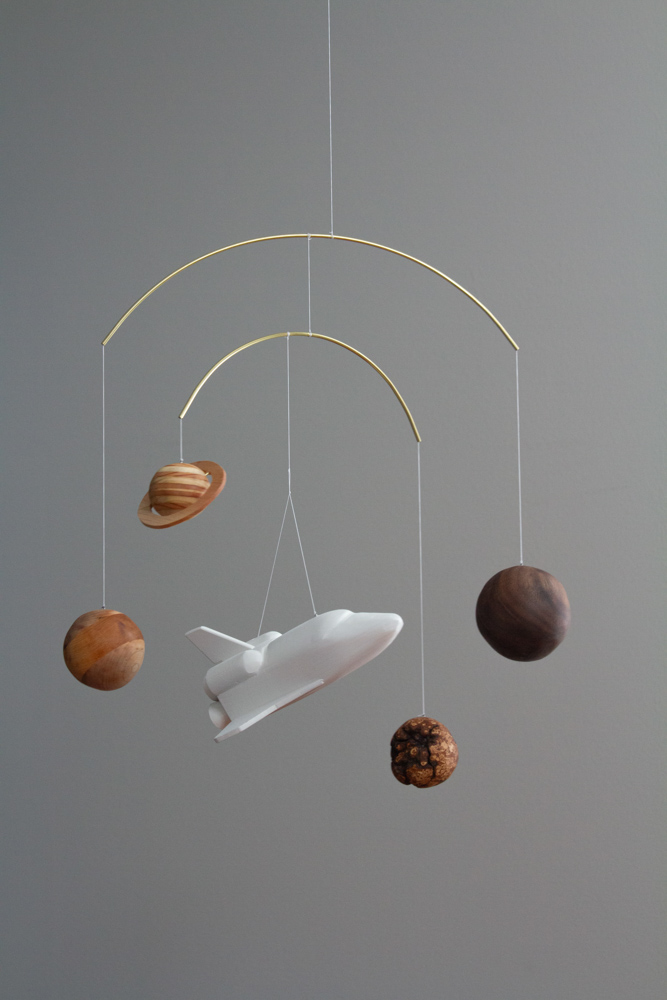 Mobile with space shuttle and four planets